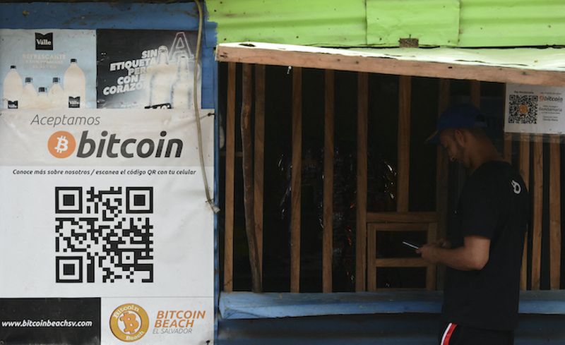 A man is seen at a store that accepts bitcoins in El zonte, 56 km south east from San Salvador, on June 09, 2021. u00e2u20acu201d ETX Studio pic