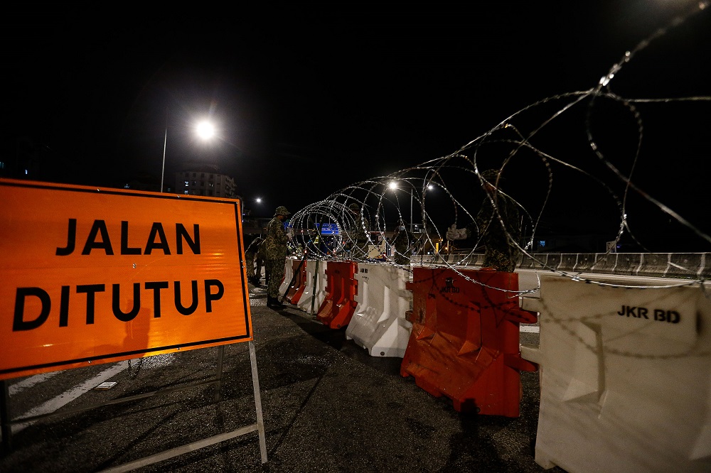 Armed Forces personnel cordon off the vicinity of Bayan Lepas with barbed wire June 4, 2021. u00e2u20acu201d Picture by Sayuti Zainudin