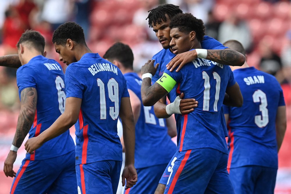 Englandu00e2u20acu2122s striker Marcus Rashford celebrates scoring his teamu00e2u20acu2122s first goal with Englandu00e2u20acu2122s defender Tyrone Mings during the international friendly football match against Romania at the Riverside Stadium in Middlesbrough, June 6, 2021. u00e2u20acu201d AFP picnn