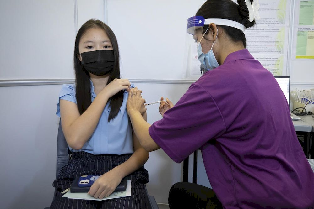 15-year-old Erin Rae Yeo receiving her Covid-19 vaccination at Bishan Community Club on June 3, 2021. u00e2u20acu201d Singapore Ministry of Education pic via TODAY