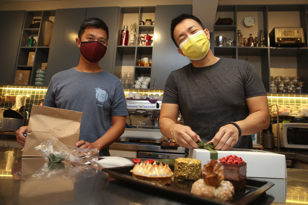 Jack Lua (right) and Chong Kin Foo (dessert maestro) of Foo Foo Fine Desserts in Taman Tun Dr Ismail, Kuala Lumpur, June 11, 2021. — Picture by Choo Choy May 