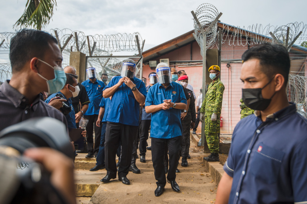 Home Minister Datuk Seri Hamzah Zainudin visits the temporary Beranang Satellite Prison and Immigration Depot in Beranang, June 3, 2021. u00e2u20acu201d Picture by Shafwan Zaidonn
