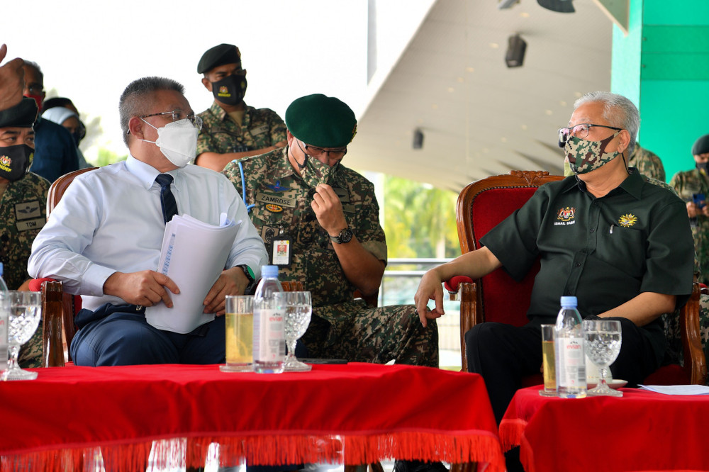 Senior Defence Minister Datuk Seri Ismail Sabri Yaakob with Health Minister Datuk Seri Dr Adham Baba at the Army drive-through vaccination centre (PPV) at the Sungai Besi Perdana Camp, June 8, 2021. u00e2u20acu201d Bernama pic 