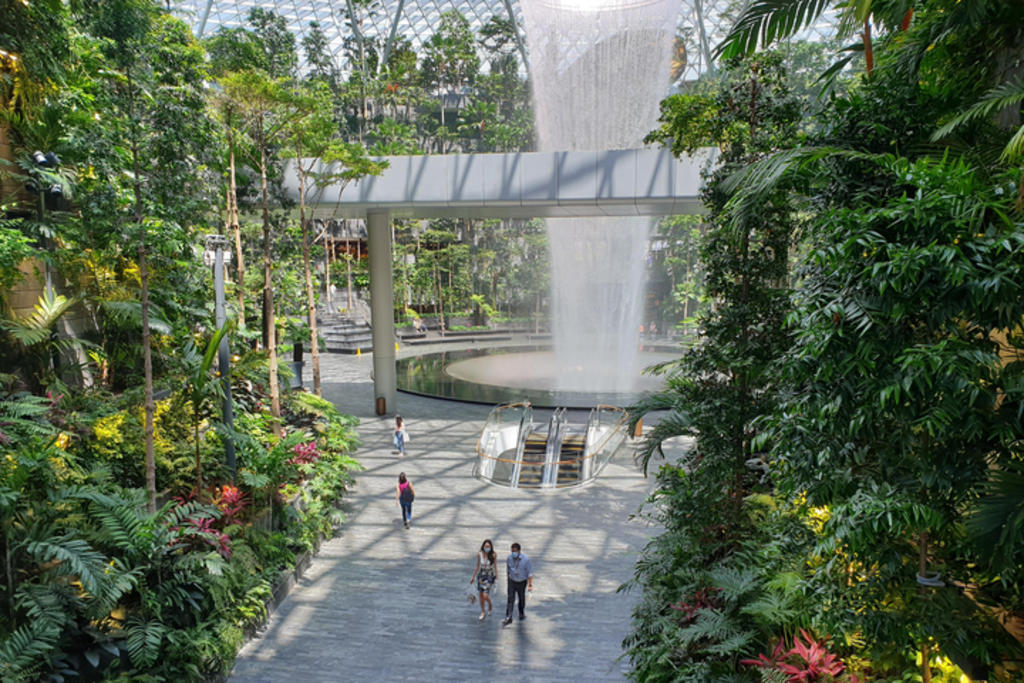 Not many people were at Jewel Changi Airport, including the Rain Vortex waterfall (pictured), when TODAY visited on June 14, 2021, the first day of its reopening after a month-long closure. u00e2u20acu2022 TODAY pic