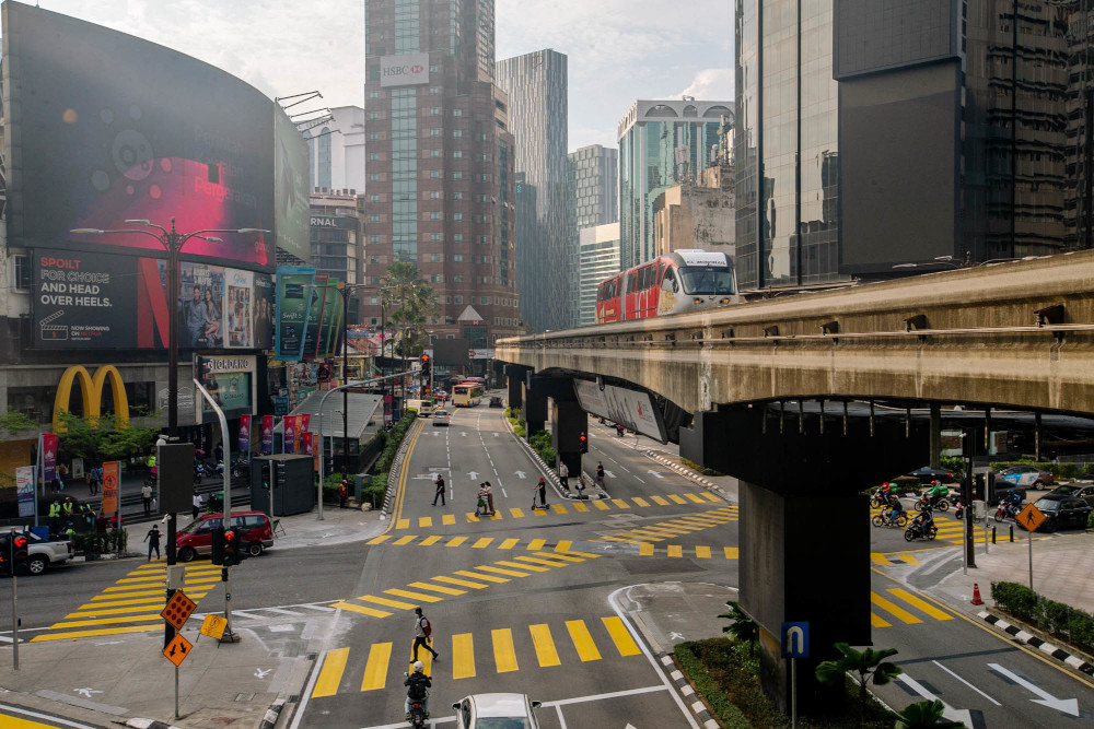 General view of the new scramble pedestrian crossing in Bukit Bintang, June 18, 2021. The crossing will allow pedestrians from all directions to cross, at the same time. u00e2u20acu201d Picture by Firdaus Latif 