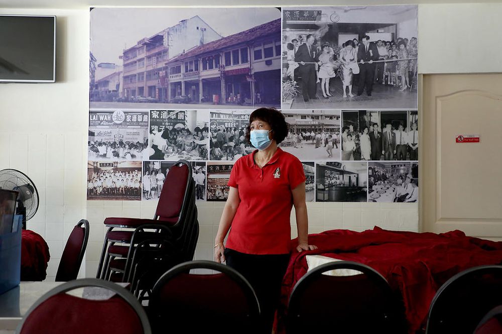 Susan Kwa, 58, head waitress at Lai Wah Restaurant. u00e2u20acu201d TODAY pic