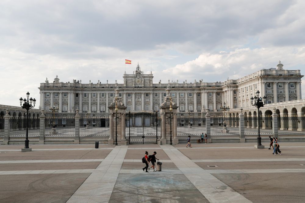 nTourists from Taiwan walk past the Royal Palace in Madrid, Spain, June 7, 2021. u00e2u20acu201d Reuters picn