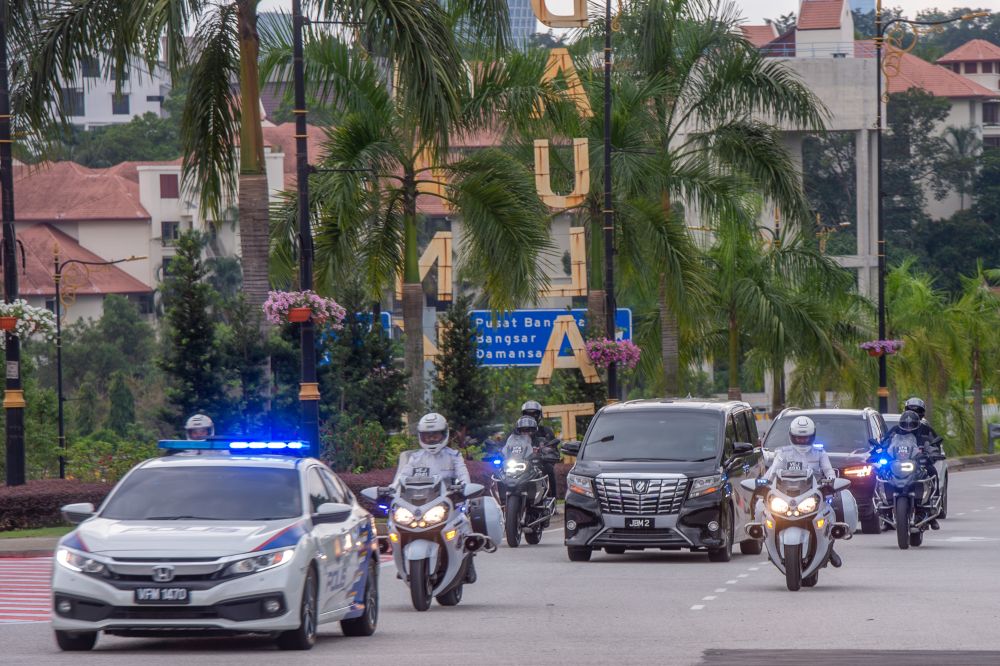 A motorcade escorting Prime Minister Tan Sri Muhyiddin Yassin is seen arriving at Istana Negara, Kuala Lumpur June 15, 2021. u00e2u20acu201d Picture by Shafwan Zaidonnn