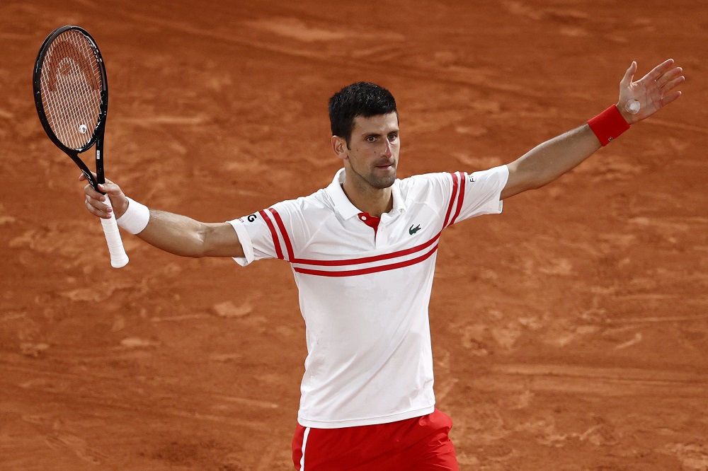 Serbia's Novak Djokovic celebrates after winning his semi final match against Spain's Rafael Nadal in Paris June 11, 2021. u00e2u20acu2022 Reuters pic