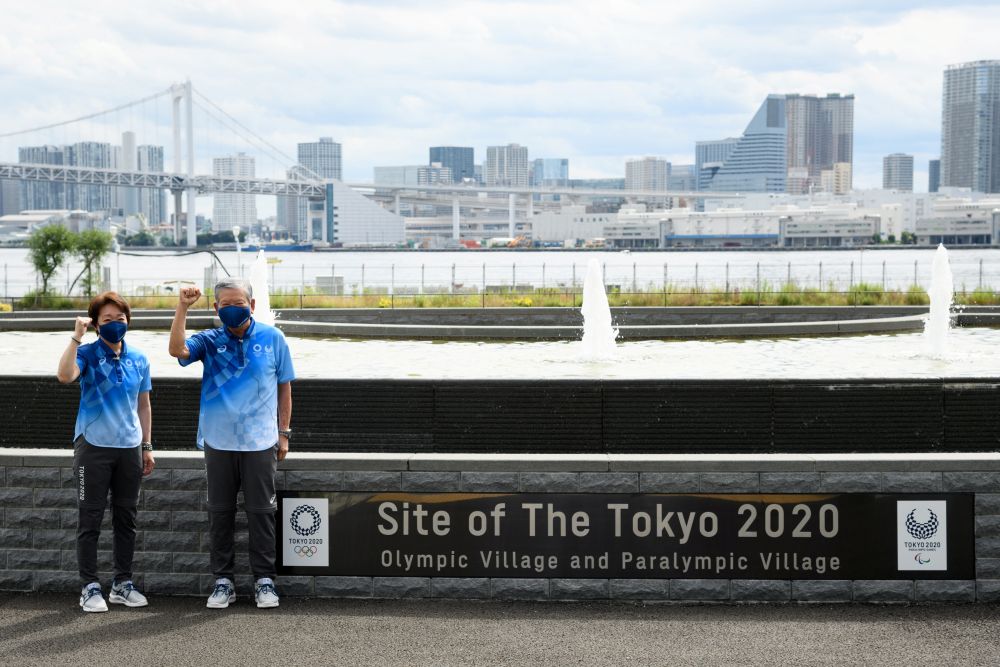 Tokyo Olympics Organising Committee president Seiko Hashimoto and Olympic Village mayor Saburo Kawabuchi pose for a photograph during a media tour at the Olympic and Paralympic Village June 20, 2021. u00e2u20acu201d Reuters pic