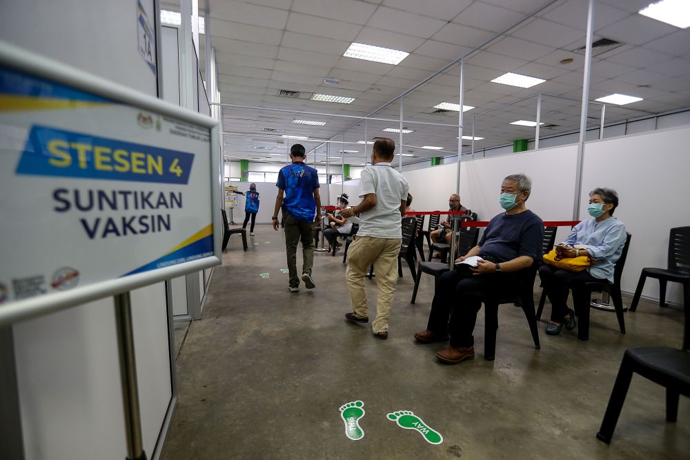 People wait to receive their Covid-19 vaccine jab at Pesta Penang, Bayan Lepas June 8, 2021. u00e2u20acu201d Picture by Sayuti Zainudin