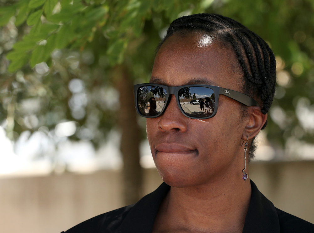 John McAfeeu00e2u20acu2122s wife Janice McAfee speaks to media as she leaves the Brians 2 prison where her husband was found dead in his prison cell after the Spanish high court had authorised his extradition to the US June 25, 2021. u00e2u20acu201d Reuters pic