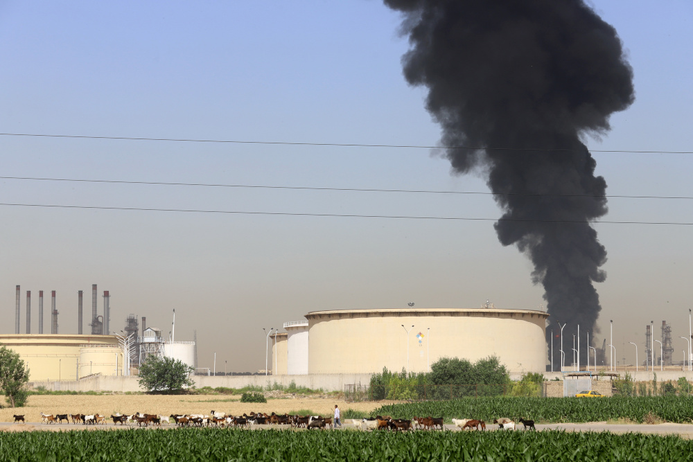 Smoke rises at an oil refinery in Tehran June 3, 2021. u00e2u20acu201d Majid Asgaripour/Wana (West Asia News Agency) pic via Reuters 