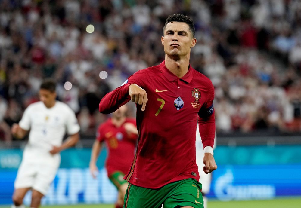Portugal's Cristiano Ronaldo celebrates scoring their first goal against France at the Puskas Arena June 23, 2021. u00e2u20acu201d Reuters pic