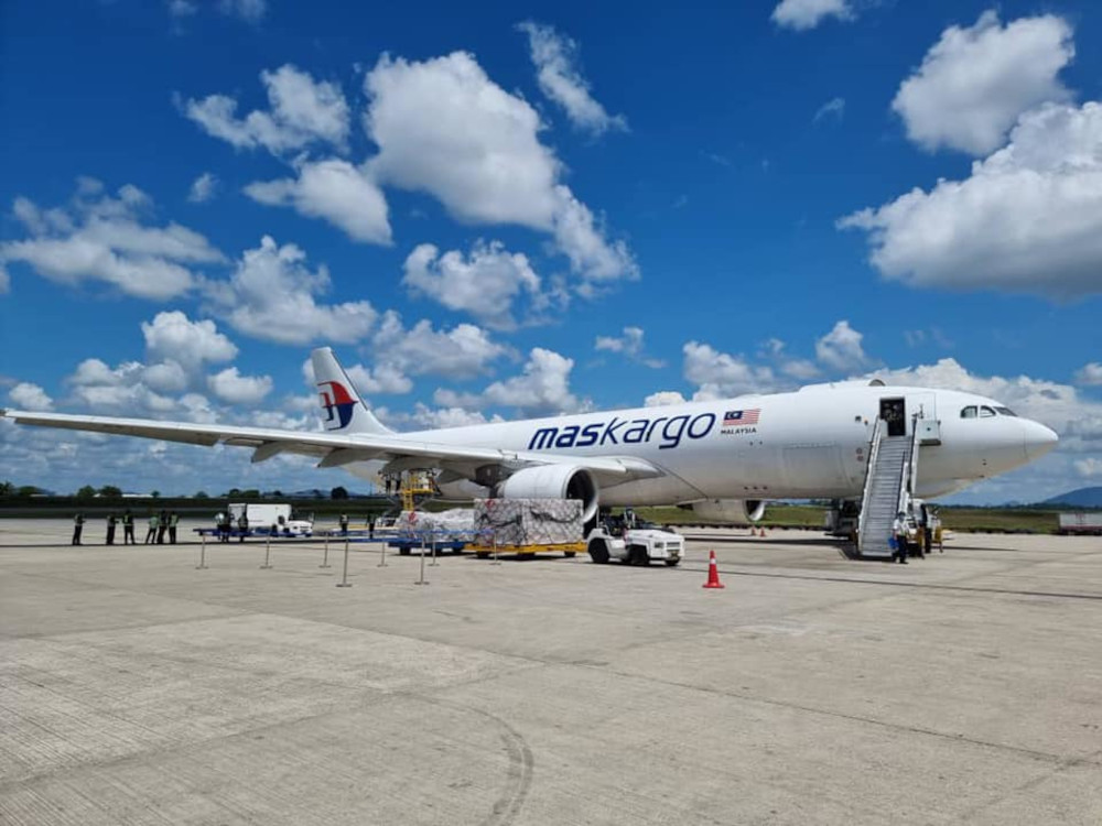 The vaccines being transported from the plane at Kuching International Airport, June 9, 2021. u00e2u20acu201d Picture from Facebook/Dr Sim Hui Kian
