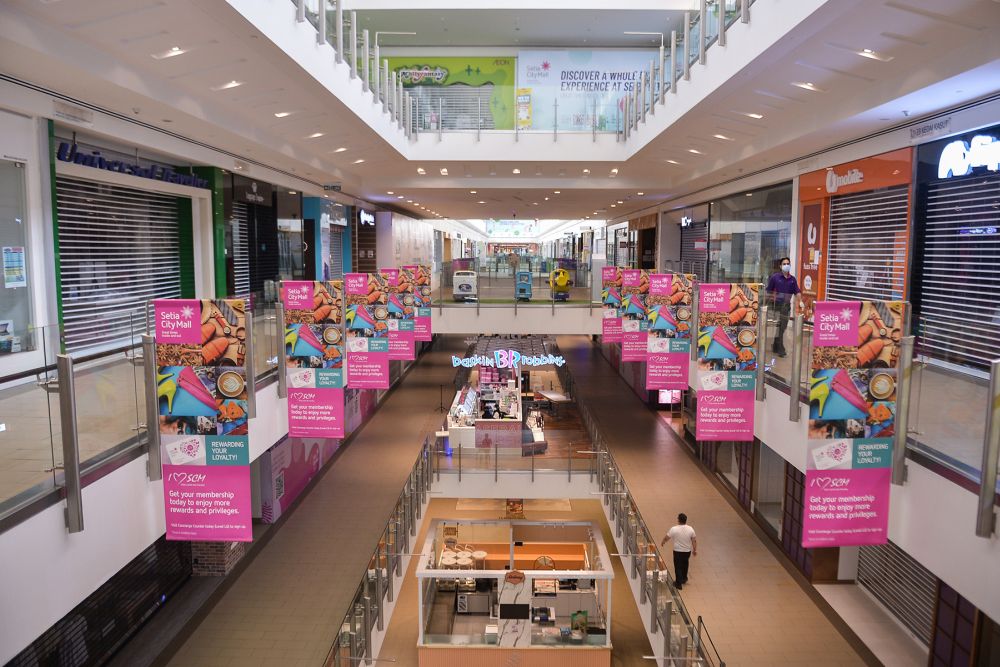 A general view of a near-deserted Setia City Mall, Shah Alam June 1, 2021. u00e2u20acu201d Picture by Miera Zulyana