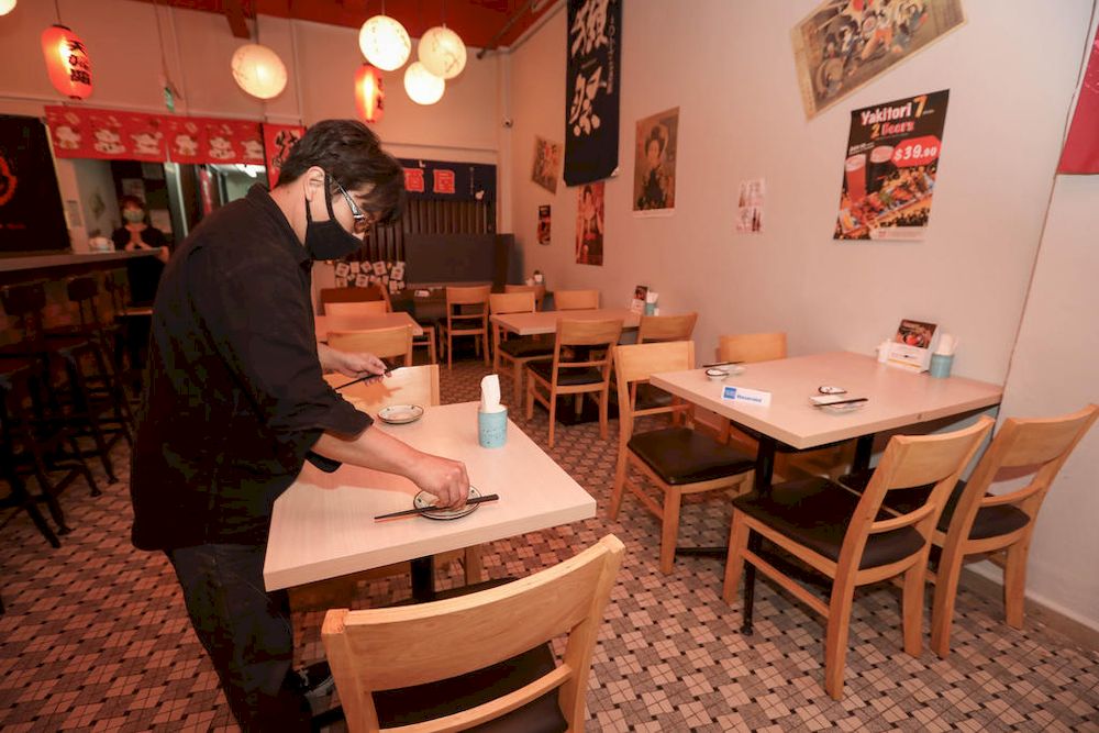 Those working in dine-in food-and-beverage establishments, personal care services, gyms and fitness studios will have to go through mandatory regular Covid-19 testing, regardless of their vaccination status. u00e2u20acu201d TODAY pic