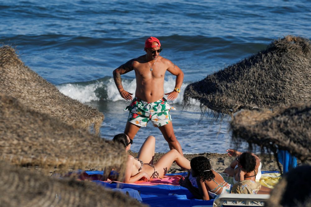 Tourists sunbathe on a beach, amid the Covi-19 pandemic in Benalmadena, southern Spain, June 7, 2021. u00e2u20acu201d Reuters pic