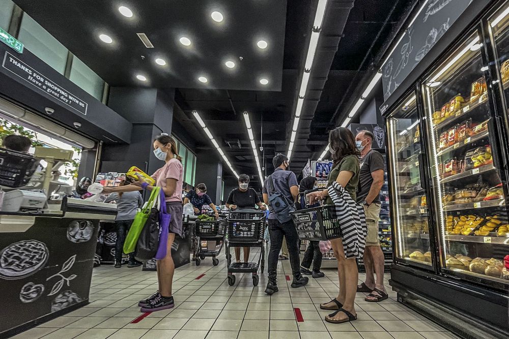 People shop for groceries at the Mercato Solaris supermarket in Mont Kiara June 7, 2021. u00e2u20acu201d Picture by Hari Anggaran