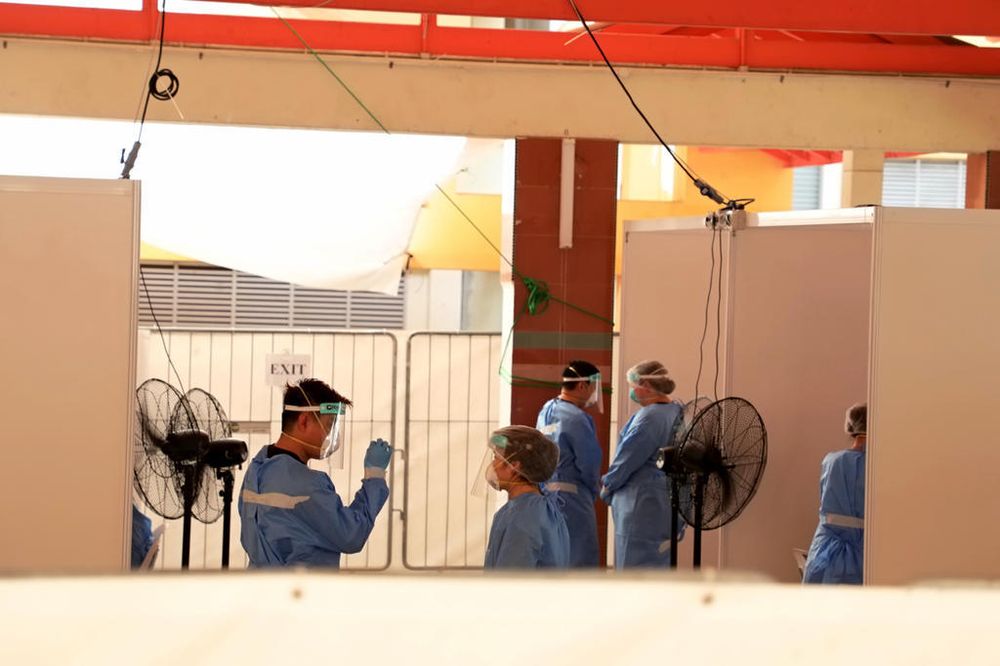 A Covid-19 testing exercise being held at Block 125A Bukit Merah View on June 14, 2021. u00e2u20acu201d TODAY pic