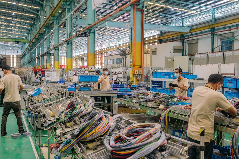 nWorkers are pictured at their stations at the Toshiba Transmission & Distribution Systems in Petaling Jaya June 1, 2021. u00e2u20acu201d Picture by Firdaus Latifn
