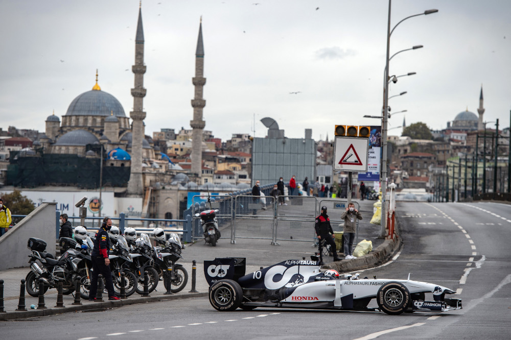 In this file photo taken November 10, 2020 Scuderia AlphaTauri Honda French Formula One driver Pierre Gasly drives his car crosses the Galata Bridge during a Formula One promotional movie shooting in Istanbul. u00e2u20acu201d AFP pic  