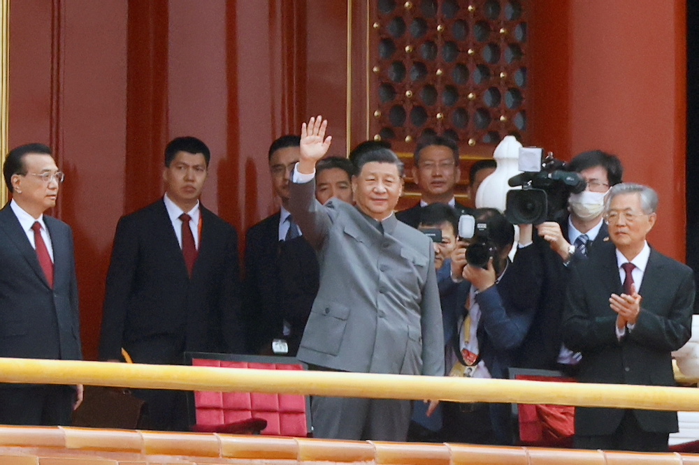 Chinese President Xi Jinping waves next to Premier Li Keqiang and former president Hu Jintao at the end of the event marking the 100th founding anniversary of the Communist Party of China, on Tiananmen Square in Beijing, China July 1, 2021. u00e2u20acu201d Reuters pi