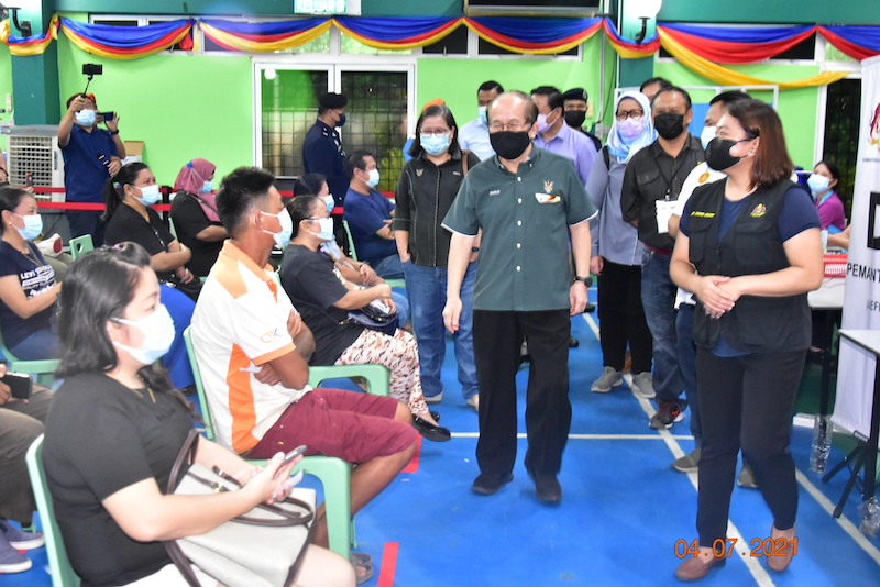 Deputy Chief Minister Datuk Amar Douglas Uggah (centre) visits the vaccine administration centre at the Fire and Rescue Department Academy in Bau July 4, 2021. u00e2u20acu201d Picture courtesy of the Chief Ministeru00e2u20acu2122s Office