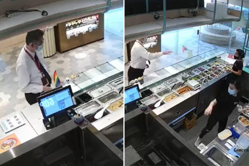 Images from surveillance footage uploaded by grain bowl stall SMOL at Lau Pa Sat food centre showed a man getting upset over an LGBTQ pride flag that was displayed there. u00e2u20acu201d Picture via TODAY