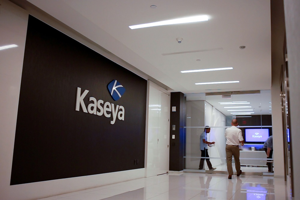 Staff enter the headquarters of information technology firm Kaseya in Miami, Florida. u00e2u20acu201d Handout by Kaseya via Reuters