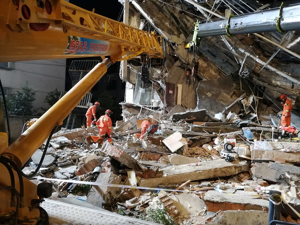 Rescue workers work at the site where a hotel building collapsed in Suzhou, Jiangsu province, China July 13, 2021. u00e2u20acu201d Picture by China Daily via Reuters