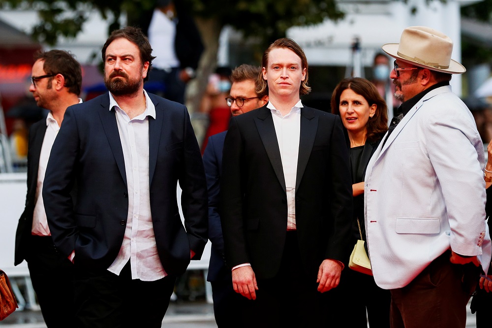 Director Justin Kurzel, cast member Caleb Landry Jones, and producer Nick Batzias pose during the screening of the film u00e2u20acu02dcNitramu00e2u20acu2122 in Cannes July 16, 2021. u00e2u20acu201d Reuters pic