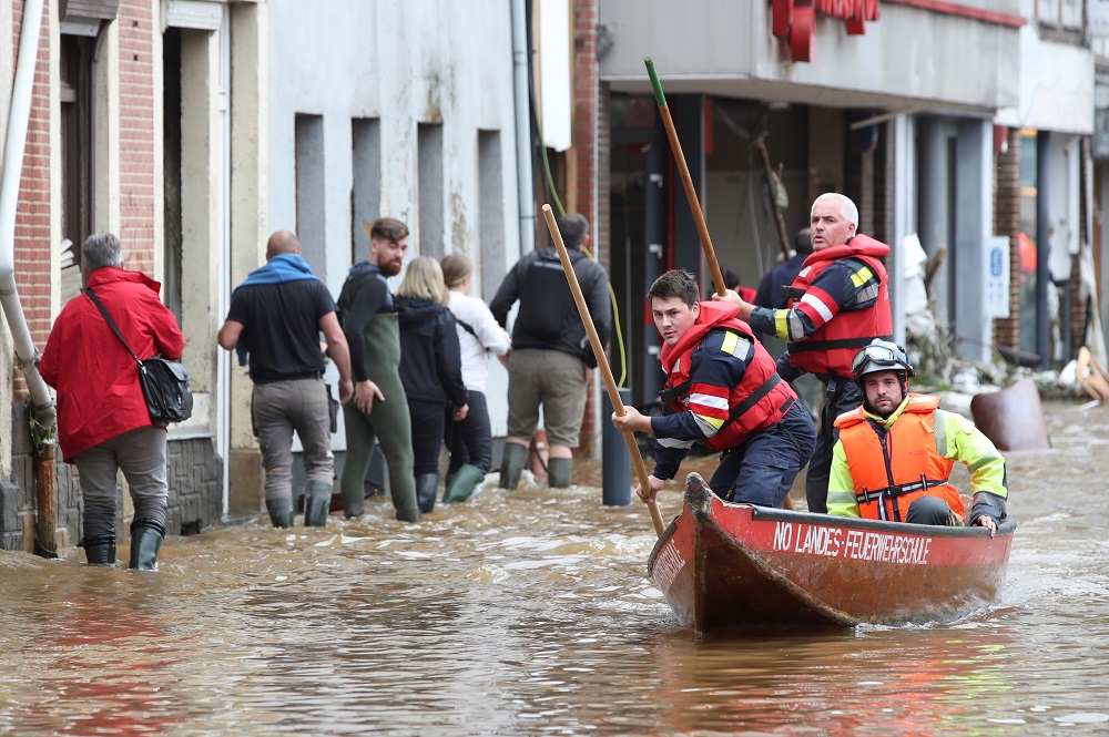 Austrian rescue team members pole their boat as they go through an area affected by floods, following heavy rainfalls, in Pepinster, Belgium July 16, 2021. u00e2u20acu201d Reuters pic