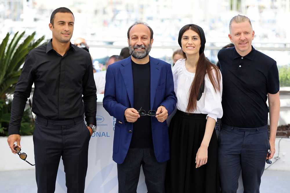 Director Asghar Farhadi, cast members Amir Jadidi and Sarina Farhadi and producer Alexandre Mallet-Guy pose for a group picture during the photocall for the film u00e2u20acu02dcA Herou00e2u20acu2122 (Ghahreman) in Cannes July 14, 2021. u00e2u20acu201d Reuters pic