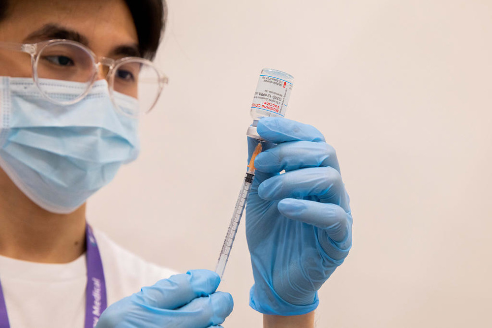 From July 7, 2021, workers administering Covid-19 vaccine shots and swab tests will be given enhanced protection against abuse or harassment in the course of their duties. u00e2u20acu201d Picture by Ili Nadhirah Mansor/TODAY