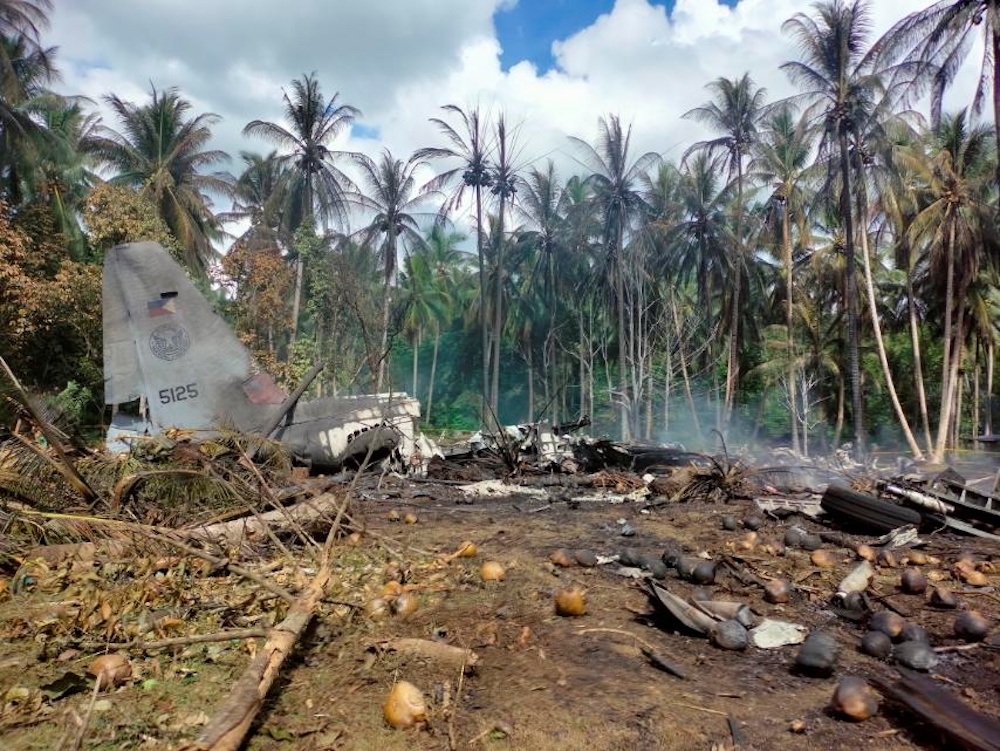 View of the site after a Philippines Air Force Lockheed C-130 plane carrying troops crashed on landing in Patikul, Sulu province, Philippines July 4, 2021. u00e2u20acu201d Joint Task Force Sulu handout via Reuters pic. 