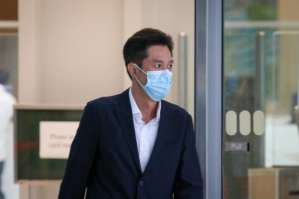 Lom Mun Hoi, 47, leaving the State Courts on July 13, 2021. u00e2u20acu201d TODAY pic