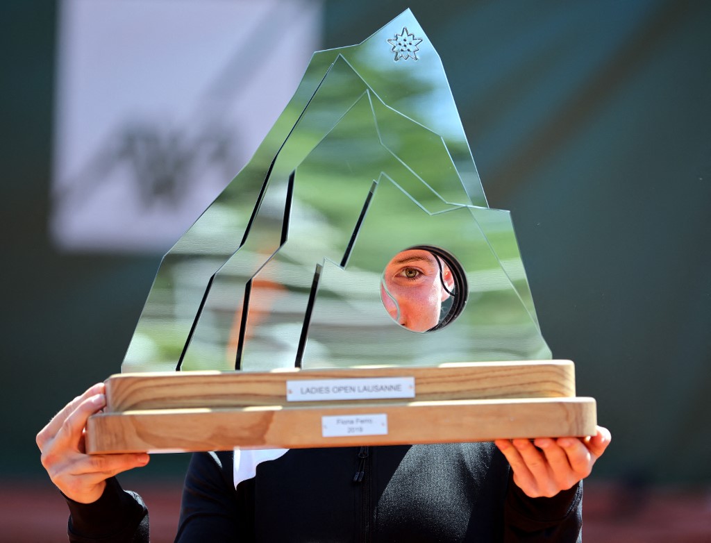 Sloveniau00e2u20acu2122s Tamara Zidansek holds her trophy after her victory over Franceu00e2u20acu2122s Clara Burel at the end of their final match at the Ladies Open Lausanne WTA tennis tournament in Lausanne on July 18, 2021. u00e2u20acu201d AFP picn n