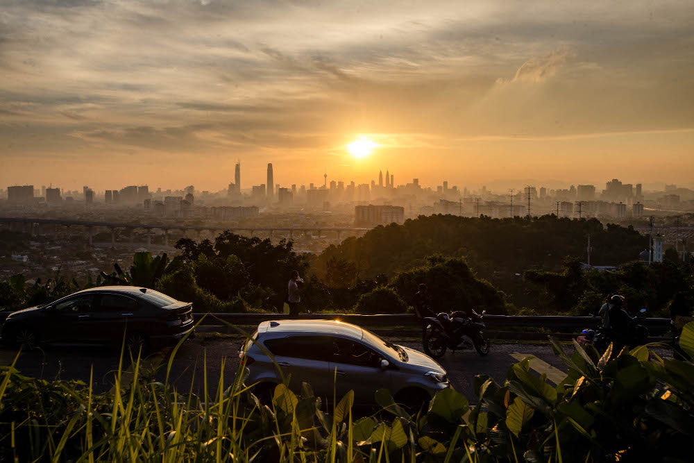 A general view of Bukit Ampang lookout point as the sun sets over the Kuala Lumpur skyline in Ampang July 20, 2021. u00e2u20acu201d Picture by Firdaus Latif 