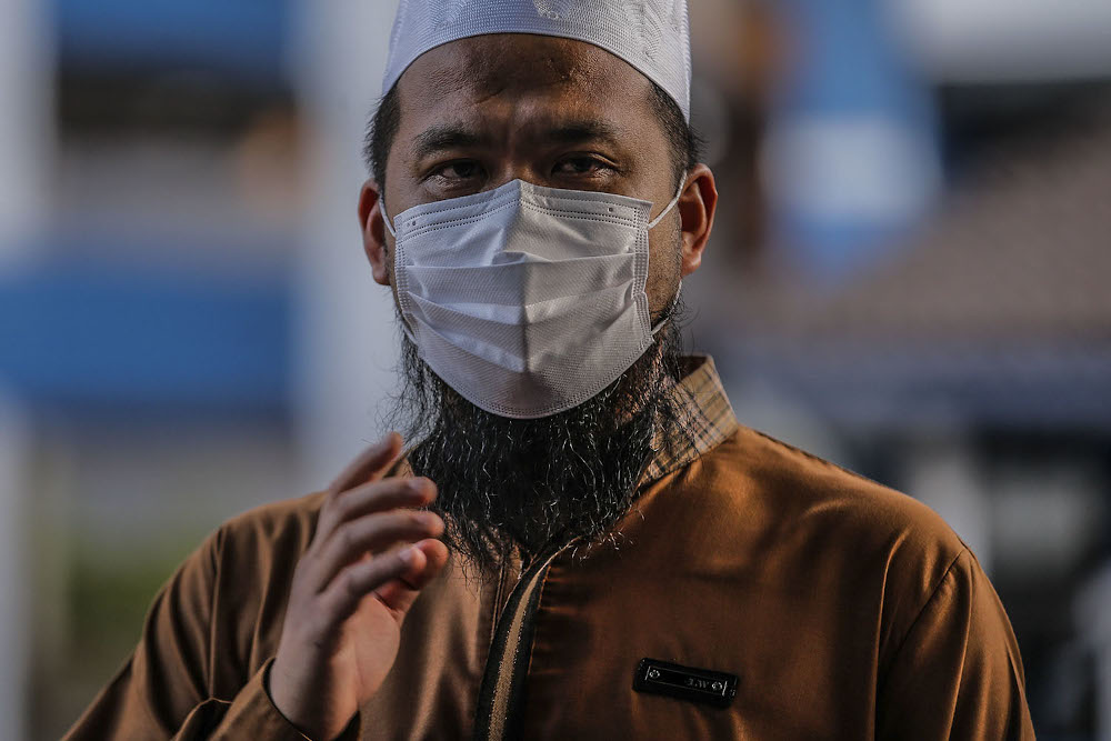 Preacher Ustaz Ebit Lew speaks to the press outside the Dang Wangi IPD after making a police report July 21, 2020. u00e2u20acu201d Picture by Hari Anggara.