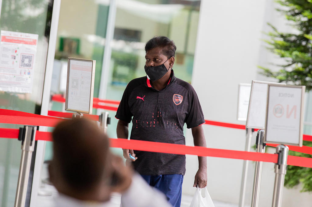 Periyanayagam Appavoo arriving at the State Courts in Singapore July 27, 2021. u00e2u20acu201d TODAY pic
