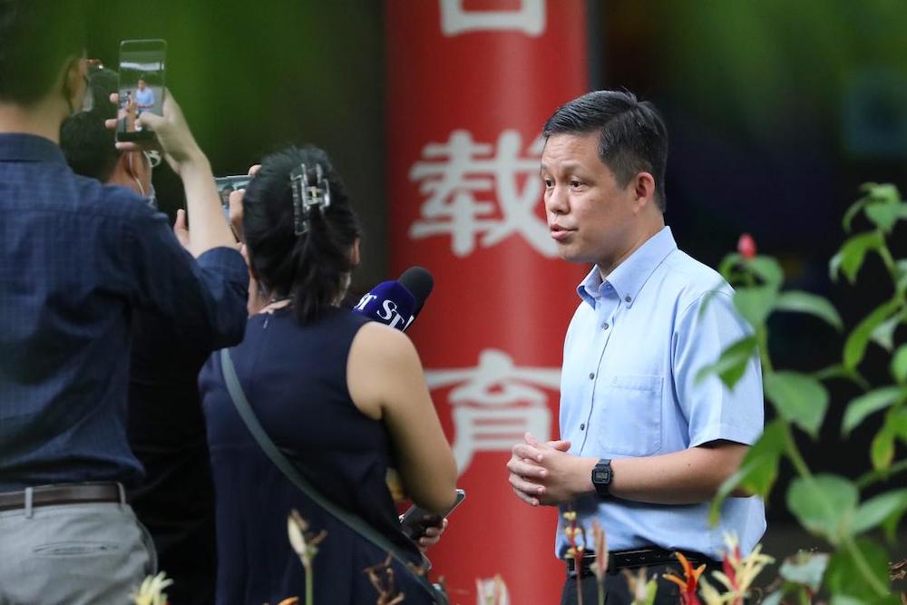 Education Minister Chan Chun Sing speaks to the media in the compound of River Valley High School in Singapore July 19, 2021. u00e2u20acu201d TODAY pic