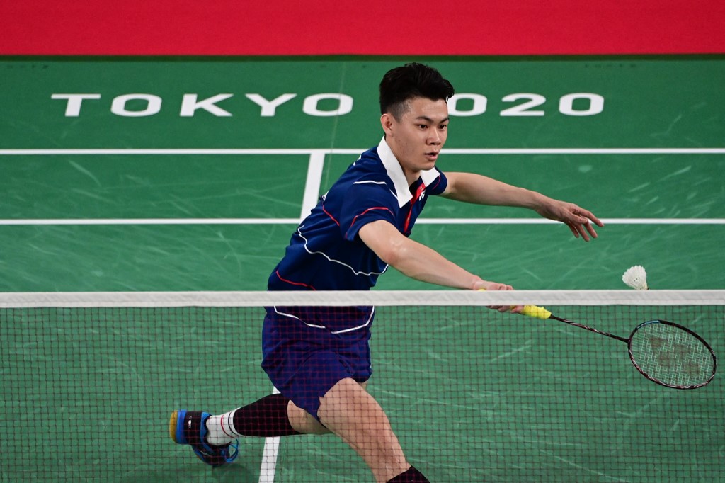 Malaysia's Lee Zii Jia hits a shot to Ukraine's Artem Pochtarov during the Tokyo 2020 Olympic Games at the Musashino Forest Sports Plaza in Tokyo on July 25, 2021. u00e2u20acu201d AFP picnn