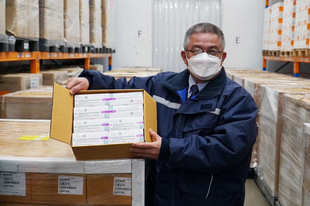 Health Minister Datuk Seri Dr Adham Baba holds a box of AstraZeneca Covid-19 vaccine July 2, 2021. — Picture courtesy of AstraZeneca 