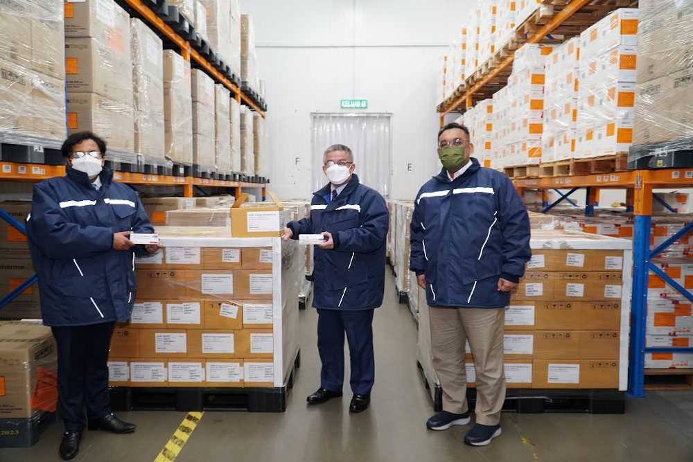 AstraZeneca Malaysia Country President Dr Sanjeev Panchal hands over 586,700 doses of Covid-19 vaccine to Health Minister Datuk Seri Dr Adham Baba July 2, 2021. u00e2u20acu201d Picture courtesy of AstraZeneca