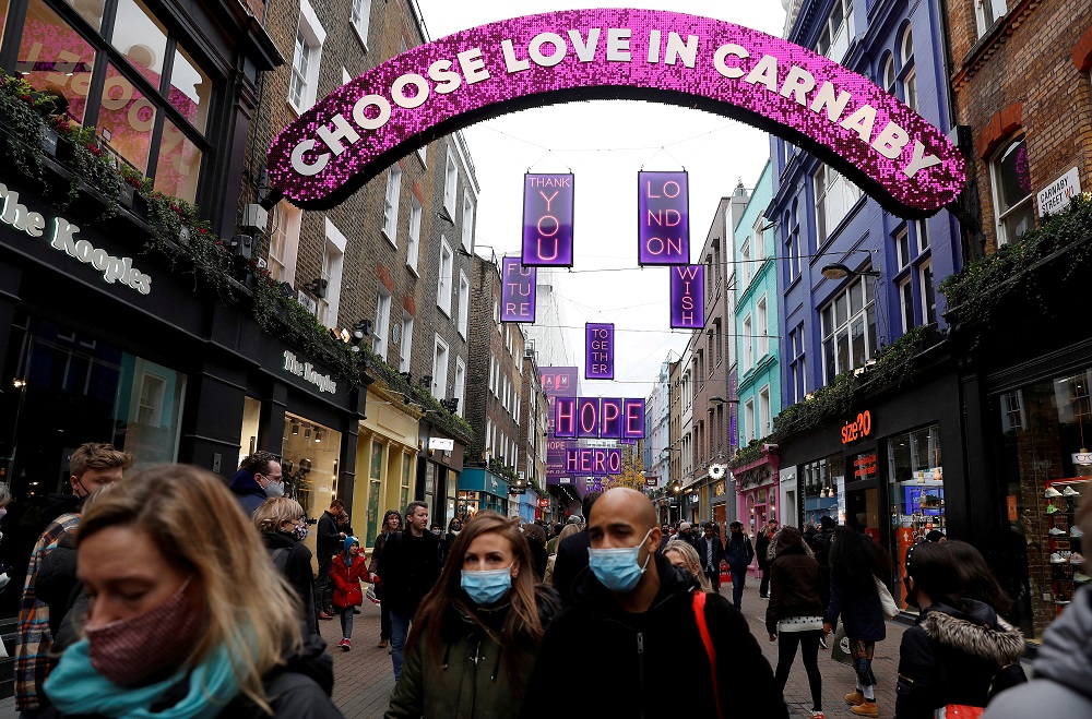 Shoppers are seen on Carnaby street amid the Covid-19 outbreak in London, Britain December 12, 2020. British retailers reported a record annual increase in sales in the three months to the end of June. u00e2u20acu2022 Reuters file pic