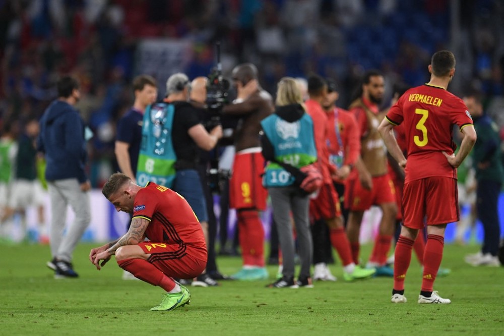 Belgiumu00e2u20acu2122s defender Toby Alderweireld (left) and Belgiumu00e2u20acu2122s defender Thomas Vermaelen (right) react at the end of the UEFA EURO 2020 quarter-final football match between Belgium and Italy at the Allianz Arena in Munich on July 2, 2021. u00e2u20acu201d AFP picnn