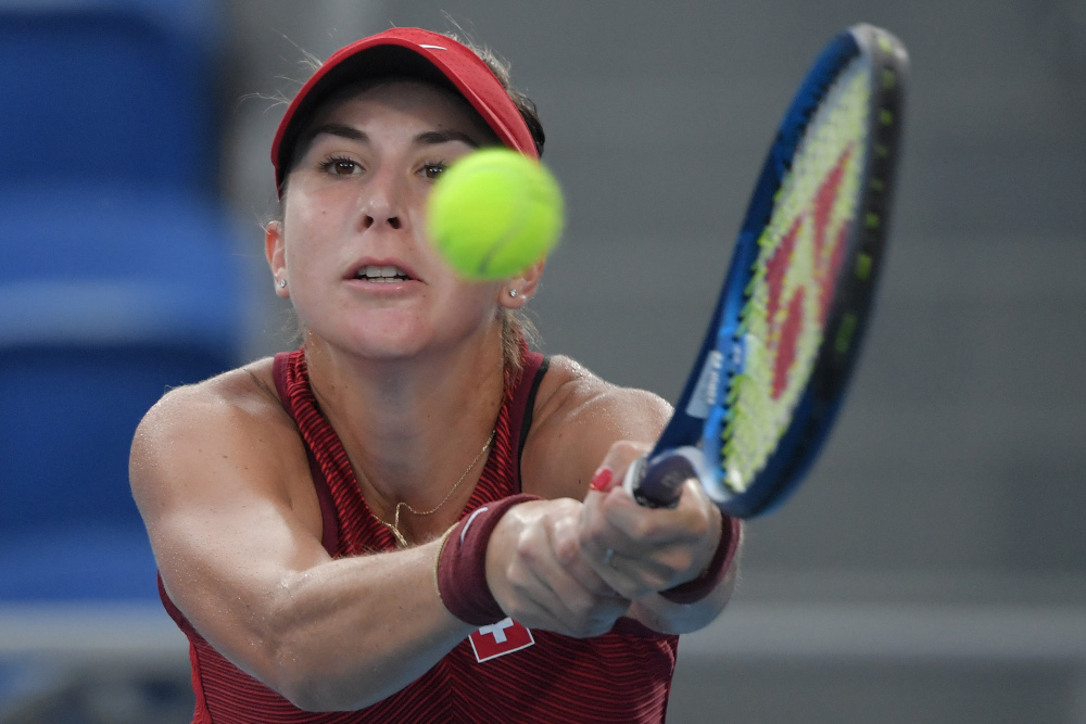 Switzerlandu00e2u20acu2122s Belinda Bencic returns the ball to Kazakhstanu00e2u20acu2122s Elena Rybakina during their Tokyo 2020 Olympic Games womenu00e2u20acu2122s singles semifinal tennis match at the Ariake Tennis Park in Tokyo July 29, 2021. u00e2u20acu201d AFP pic 