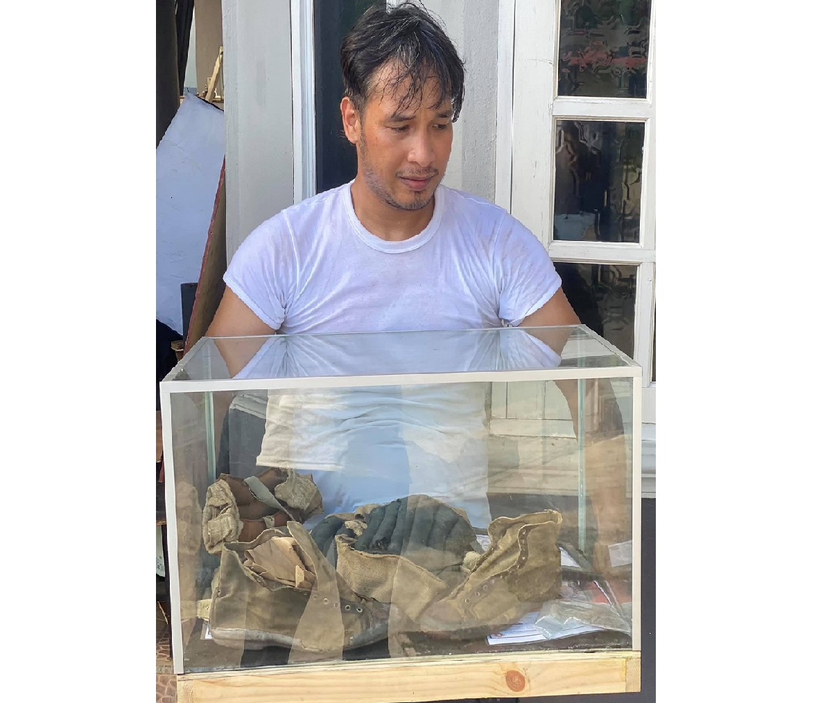 Wan Irfayuim Azim parted with his prized pair of 104-year-old Converse Non Skid for RM40,800. u00e2u20acu2022 Picture via Facebook/JeroongWia