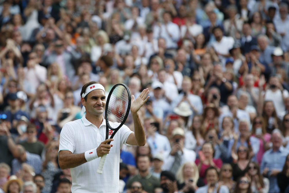 Switzerlandu00e2u20acu2122s Roger Federer celebrates winning his second round Wimbledon match against Franceu00e2u20acu2122s Richard Gasquet at the All England Lawn Tennis and Croquet Club in London, July 1, 2021. u00e2u20acu201d Reuters pic